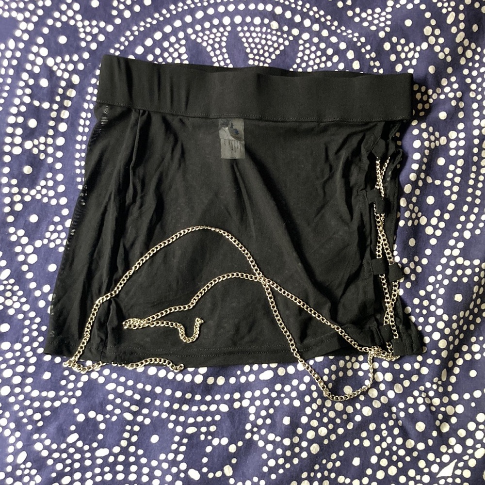 Black mesh mini skirt